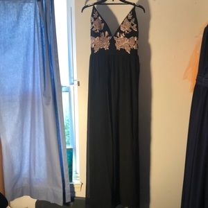 New black, backless gown